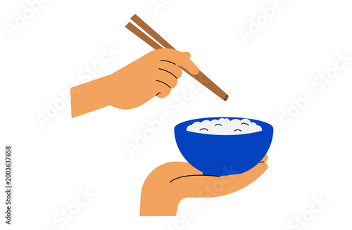 お茶碗のご飯とお箸を持つ手元