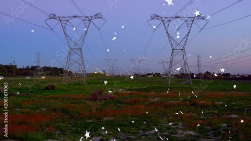 White star particles appearing lower-right, drifting upward over towers, highlighting dusk corridor