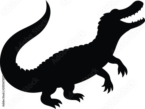 Black silhouette of an alligator with mouth open, dangerous reptile in aggressive stance.