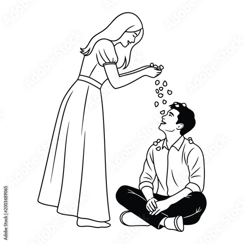 A smiling woman in a long dress gently showering small flower petals down onto a happy man sitting crosslegged symbolizing romance and affection