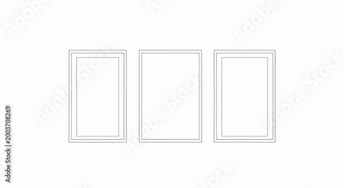 Three empty picture frames side by side.