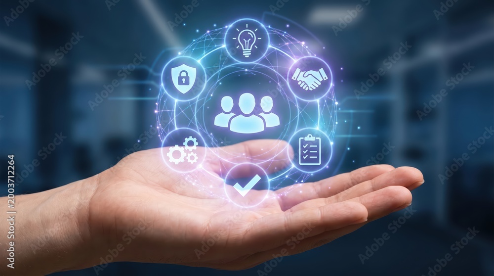 Fototapeta premium A human hand holding a glowing digital interface with business representing teamwork security innovation handshake and task management in a blue office environment