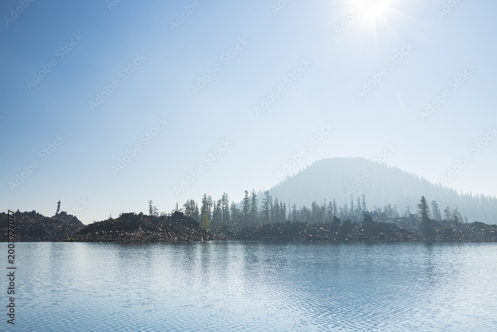Fototapeta premium Wizard Island in the fog at Crater Lake National Park, Oregon