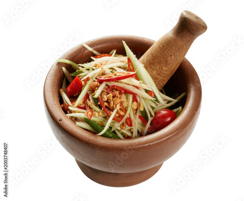 Traditional thai papaya salad inside a brown clay mortar and pestle on a white background