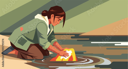 A young woman kneeling at the water's edge, hand-washing a bright yellow cloth