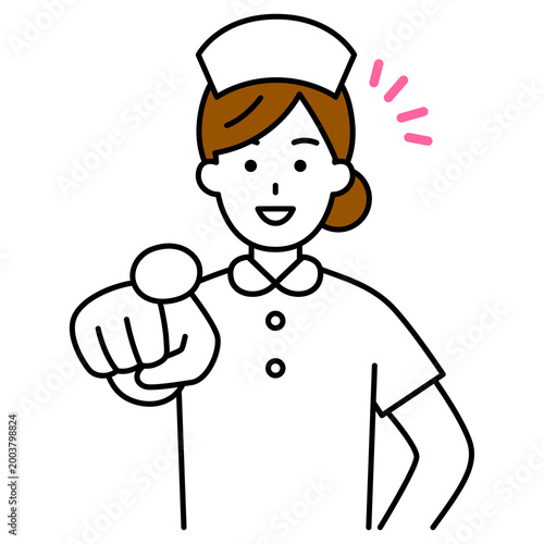 笑顔で指差す女性看護師