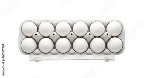 Fresh white chicken eggs in cardboard carton, dozen organic eggs in paper tray, overhead view of twelve raw eggs isolated on white background