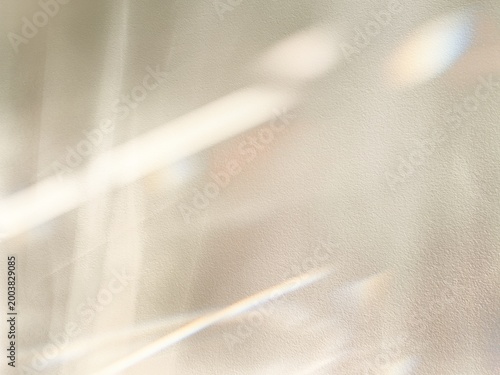 Bild auf Leinwand Abstract prismatic light flow and rainbow refraction on neutral textured wall fo