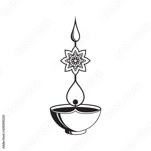 A stylized black and white illustration of a traditional oil lamp or diya