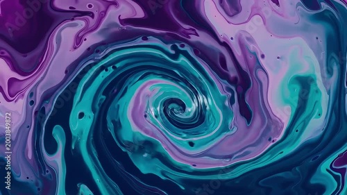 Abstract swirling patterns of purple and teal paint blend together in a mesmerizing fluid art creation, creating a vibrant and energetic mood.