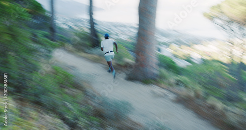 Φωτογραφία Fitness, black man and running in forest with motion blur, body health and cardio endurance workout