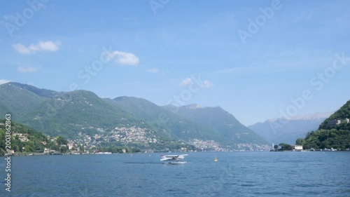Como, Italy,2026,april,2nd, the seaplane sails on water aerodrome