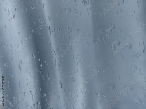 ガラス窓の雨だれ・雨粒のテクスチャ　背景
