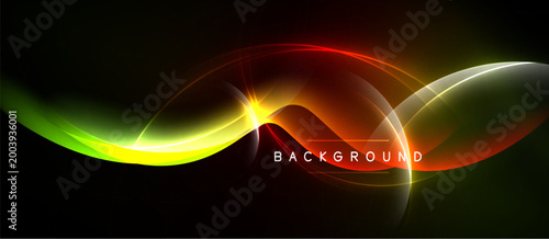 Abstract vibrant waves, flowing light. Colors blend, creating dynamic visual effect. Dark background emphasizes luminosity.