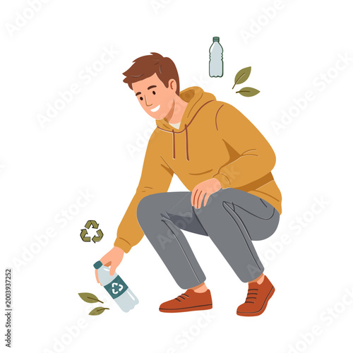 Man picking up plastic bottles for recycling in a park