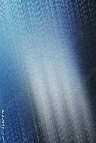 Abstract blue and white diagonal light streaks with grainy texture