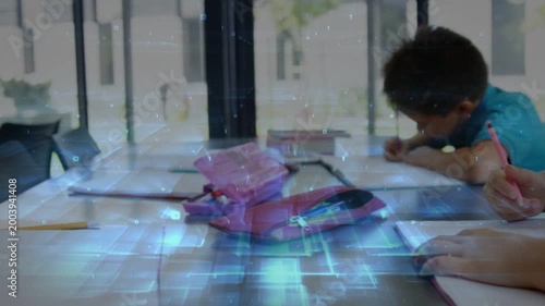 Two boys starting lesson, writing notebooks at table, pink pencil case, digital overlay drifting