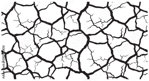 Fotografie Cracked earth texture with deep black lines on white background illustrating dro