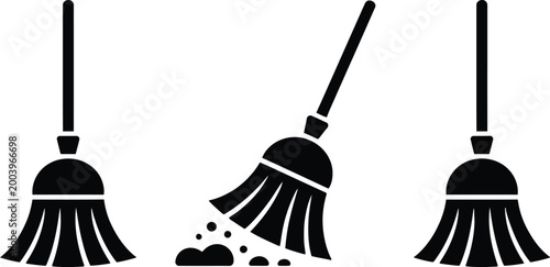 Broom icons, sweeping dirt and debris black and white flat vector illustration for cleaning service housekeeping and maintenance design concepts.