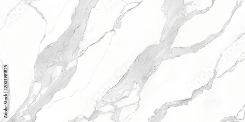 Konstfotografi Modern statuario marble, with thin and thick vertical veining patterns, is used in interior kitchen or bathroom ceramic tile designs featuring a grey and brown color natural texture background