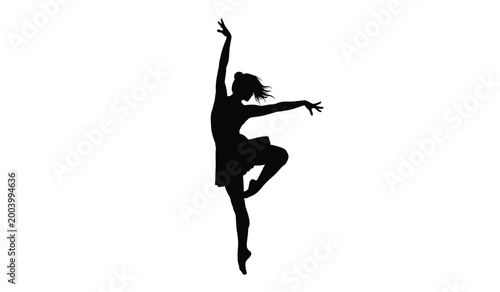 фотографія A dynamic black silhouette captures a woman in mid dance arms outstretched and b