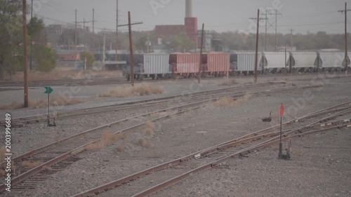 Rail Yard Tracks with Freight Cars and Signal Markers