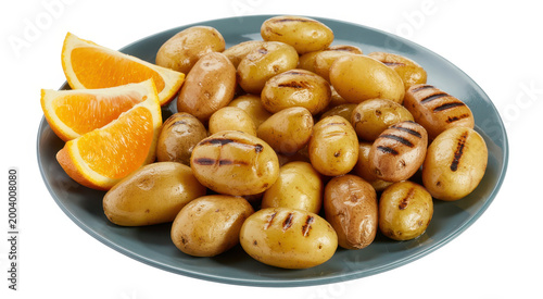 Grilled baby potatoes served on a blue plate with fresh orange slices for a healthy side dish