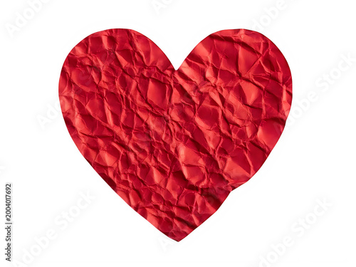 Red heart symbol with crumpled paper texture