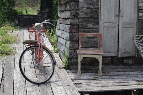 old bicycle on a wooden wall