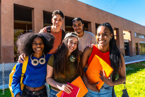 Group of diverse university students smiling on campus