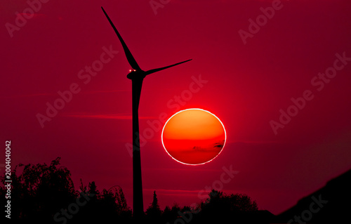 Sunset with wind turbine