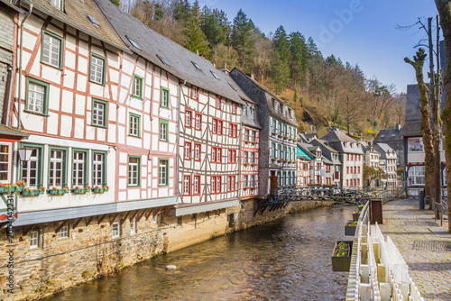 Fotografie Colorful half timbered houses at the Ruhr river in Monschau, Germany
