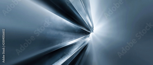 Abstract blue motion blur tunnel with bright light ahead, symbolizing speed, technology, future travel, and dynamic digital movement.