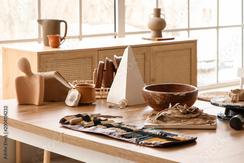 Table with clay figures, ca...