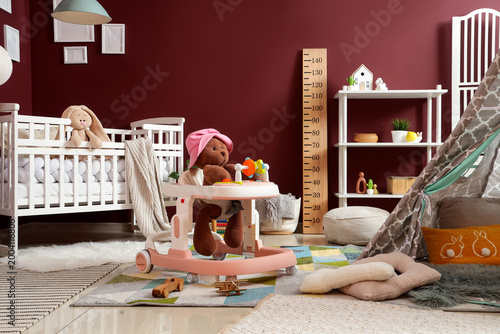 Baby walker with plush bear...