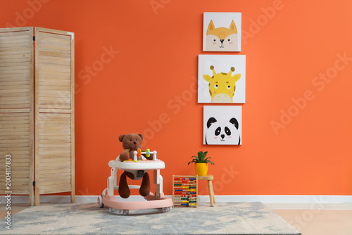 Baby walker with toy bear a...