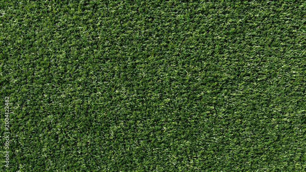 Obraz premium Seamless pattern of astro turf grass texture from a top view, suitable for sports-themed backgrounds