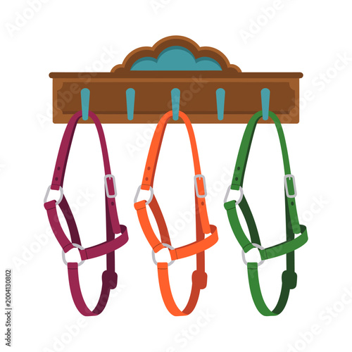 Colorful horse halters hanging on wooden hanger hooks  equestrian equipment