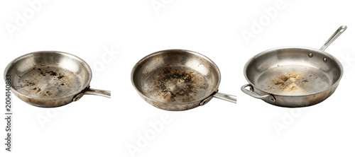 Φωτογραφία Used stainless steel frying pans with burnt food marks, rustic cookware lined si