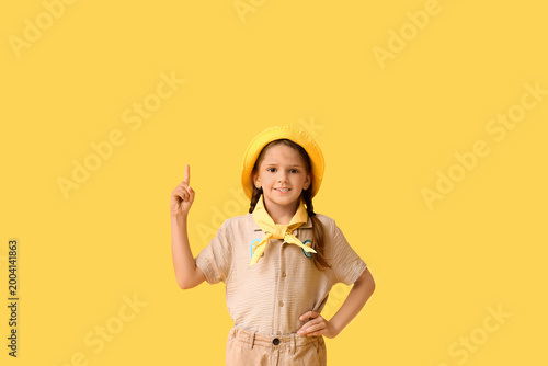 Little girl scout pointing ...