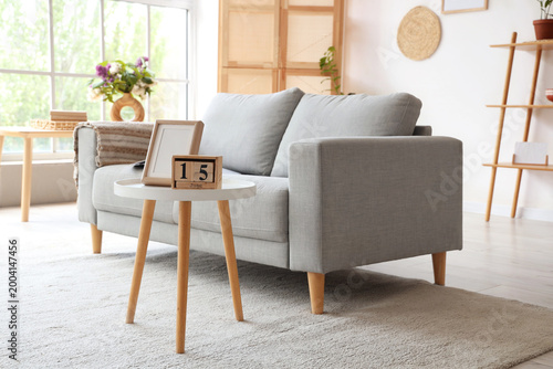 Grey sofa and coffee table ...