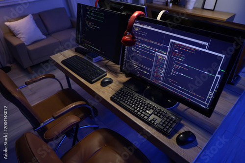 Programmer's desk with comp...