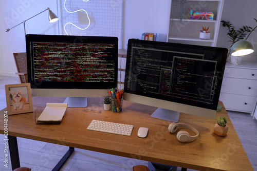 Programmer's desk with comp...