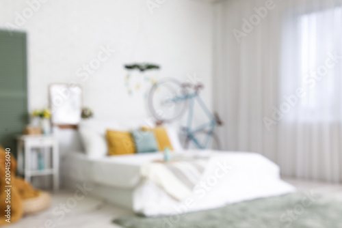 Blurred view of bedroom dec...
