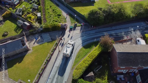 Drone. Road surface repair truck in an urban street. 