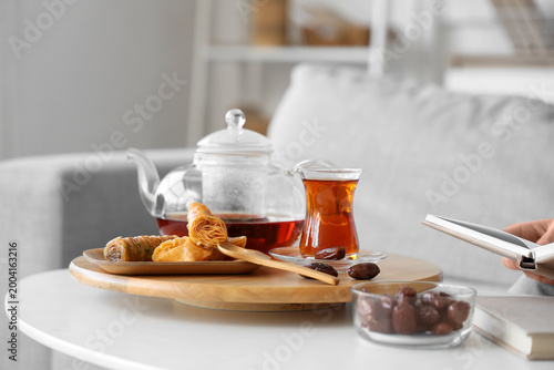 Tray with glasses, teapot o...