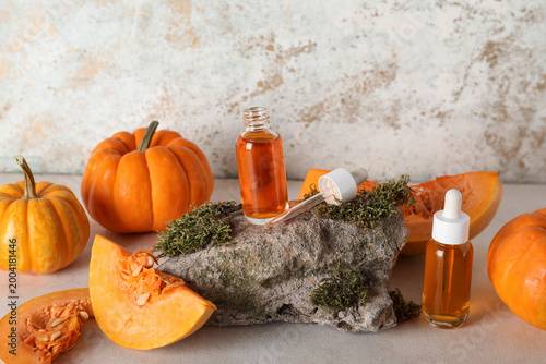 Stone with bottles of cosme...