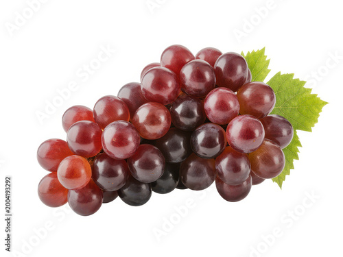 Fresh bunch of ripe red grapes with green leaves isolated on a plain white background, studio shot