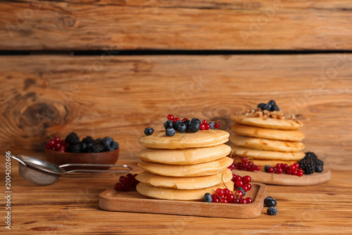 Boards of sweet pancakes wi...