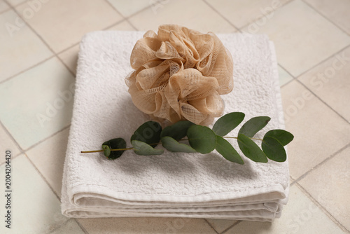 Bath sponge, clean towel an...